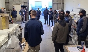 Team meeting in the warehouse