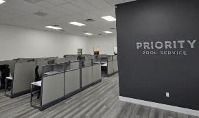 Office floor with Priority Pool Service sign
